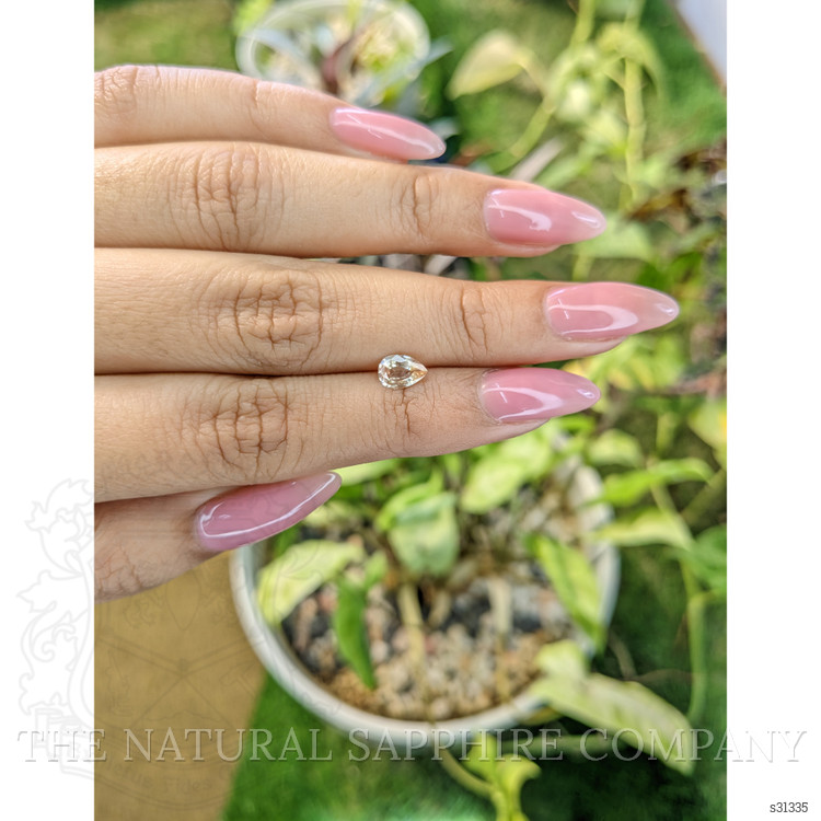 0.67 Ct. Peach Sapphire from Ceylon (Sri Lanka)