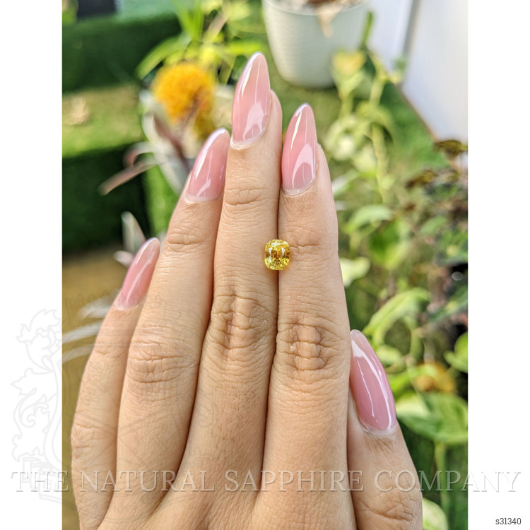 1.76 Ct. Orangish Yellow Sapphire from Ceylon (Sri Lanka)