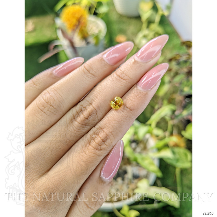 1.76 Ct. Orangish Yellow Sapphire from Ceylon (Sri Lanka)