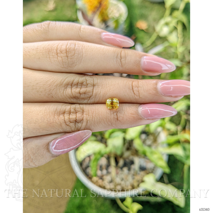 1.76 Ct. Orangish Yellow Sapphire from Ceylon (Sri Lanka)