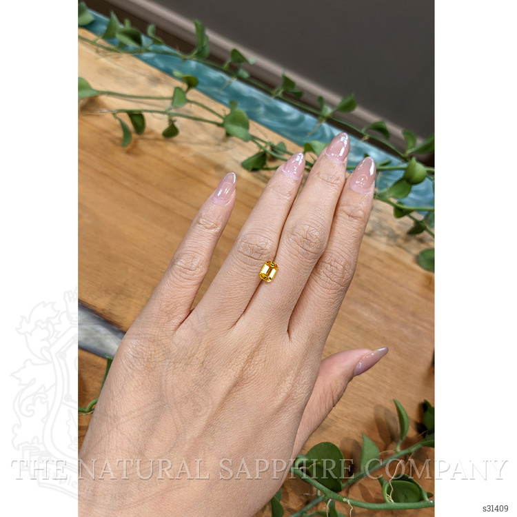 1.08 Ct. Orangish Yellow Sapphire from Ceylon (Sri Lanka)