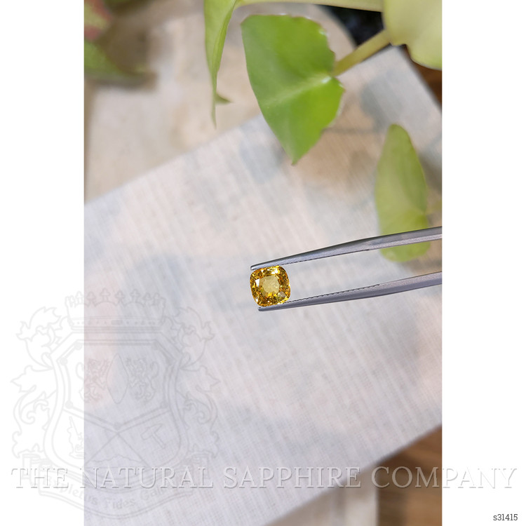 1.74 Ct. Orangish Yellow Sapphire from Ceylon (Sri Lanka)