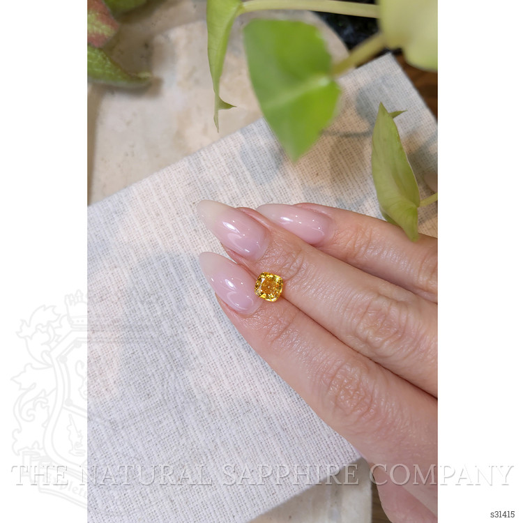 1.74 Ct. Orangish Yellow Sapphire from Ceylon (Sri Lanka)