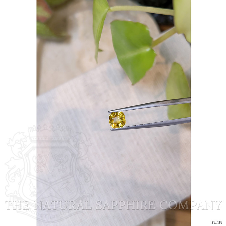1.54 Ct. Orangish Yellow Sapphire from Ceylon (Sri Lanka)