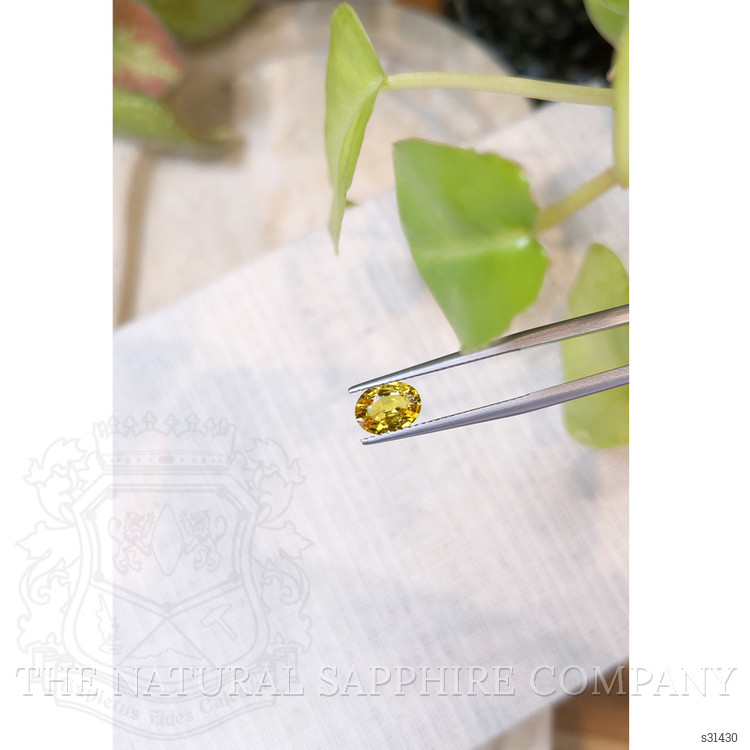 1.33 Ct. Orangish Yellow Sapphire from Ceylon (Sri Lanka)