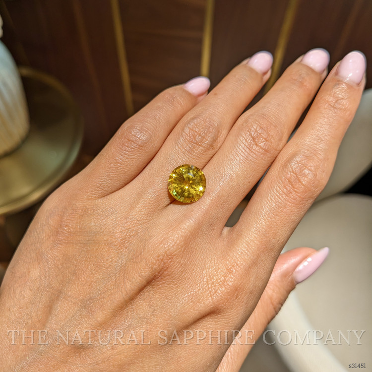 8.11 Ct. Orangish Yellow Sapphire from Ceylon (Sri Lanka)