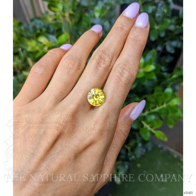 8.11 Ct. Orangish Yellow Sapphire from Ceylon (Sri Lanka)
