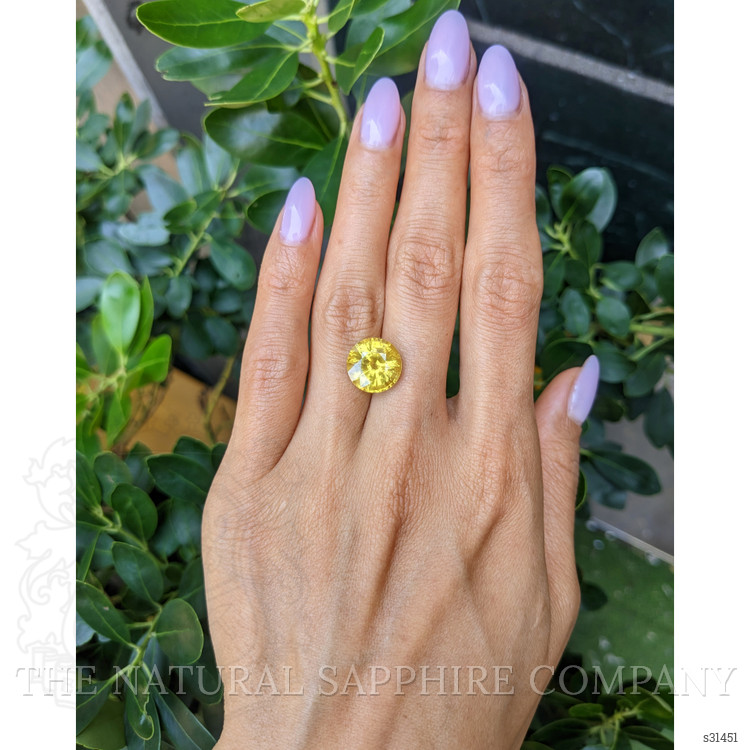 8.11 Ct. Orangish Yellow Sapphire from Ceylon (Sri Lanka)
