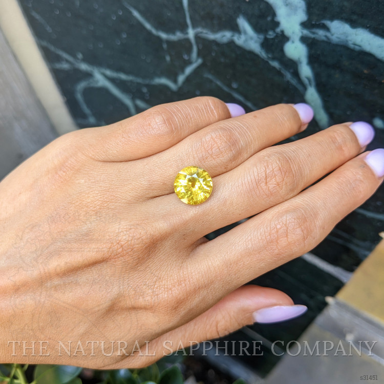 8.11 Ct. Orangish Yellow Sapphire from Ceylon (Sri Lanka)