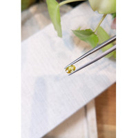 0.74 Ct. Orangish Yellow Sapphire from Ceylon (Sri Lanka) Life Style