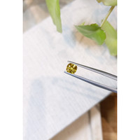 0.92 Ct. Orangish Yellow Sapphire from Ceylon (Sri Lanka) Life Style