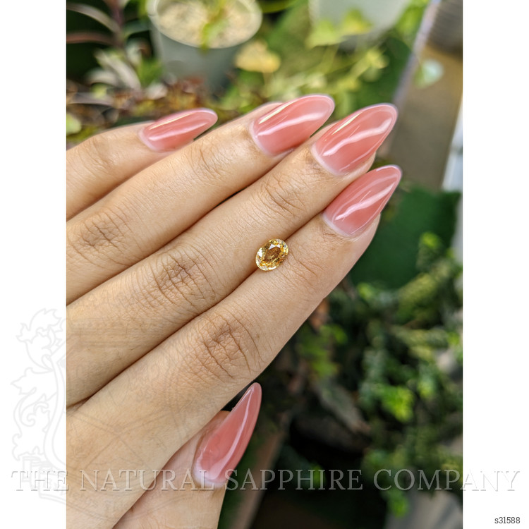 0.98 Ct. Yellowish Orange Sapphire from Ceylon (Sri Lanka)