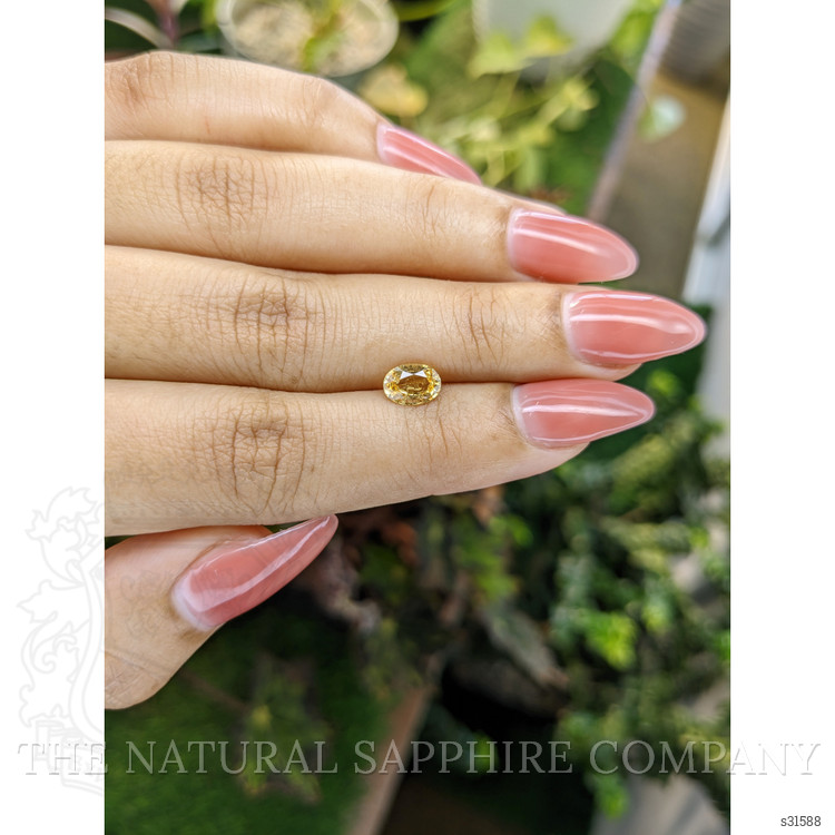 0.98 Ct. Yellowish Orange Sapphire from Ceylon (Sri Lanka)