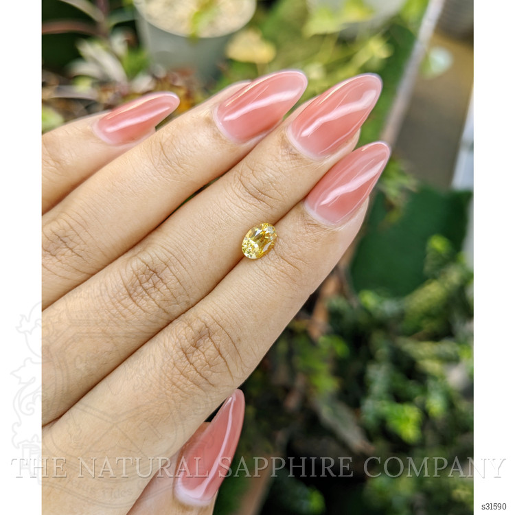 1.11 Ct. Orangish Yellow Sapphire from Ceylon (Sri Lanka)