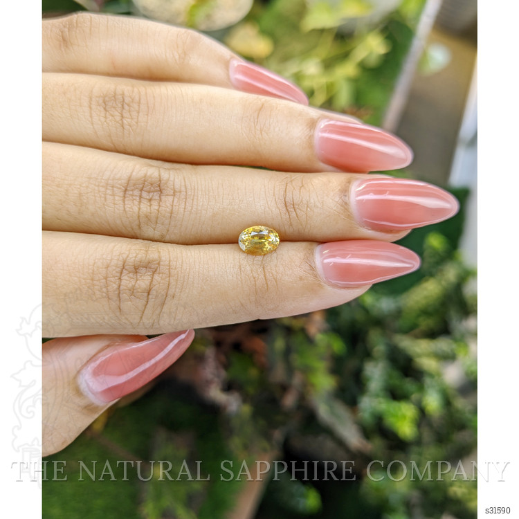 1.11 Ct. Orangish Yellow Sapphire from Ceylon (Sri Lanka)