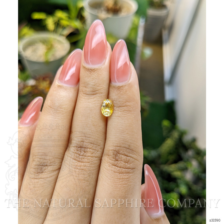 1.11 Ct. Orangish Yellow Sapphire from Ceylon (Sri Lanka)