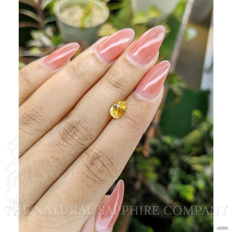 1.31 Ct. Orangish Yellow Sapphire from Ceylon (Sri Lanka)