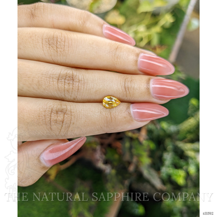 1.31 Ct. Orangish Yellow Sapphire from Ceylon (Sri Lanka)