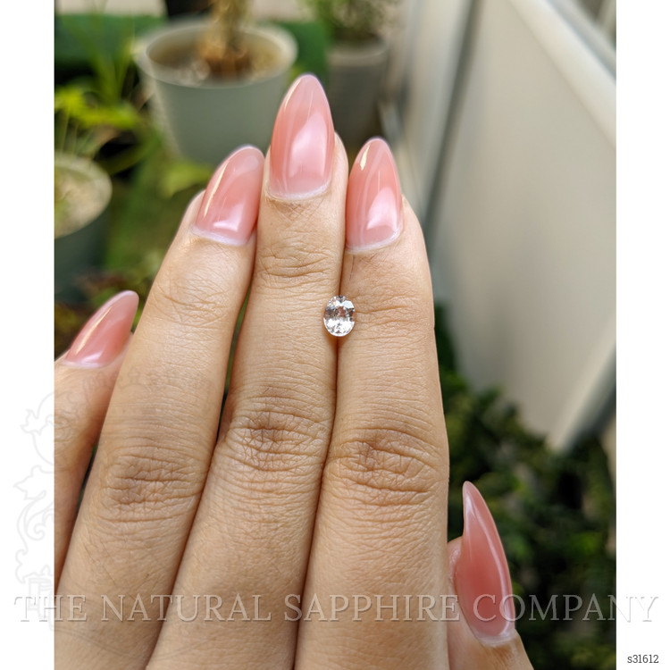 0.62 Ct. Peach Sapphire from Ceylon (Sri Lanka)