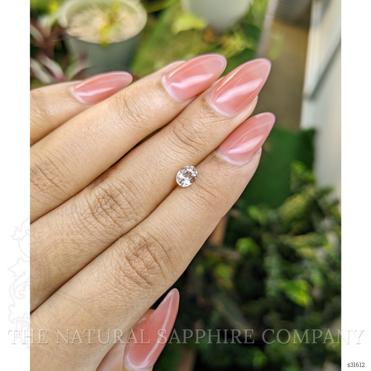 0.62 Ct. Peach Sapphire from Ceylon (Sri Lanka)