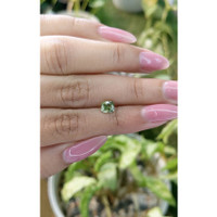 1.09 Ct. Yellowish Green Sapphire from Madagascar Life Style