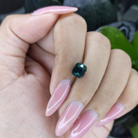 2.55 Ct. Bluish Green Sapphire from Madagascar Life Style