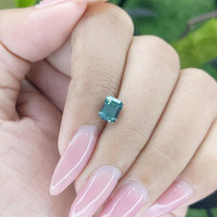 1.55 Ct. Bluish Green Sapphire from Madagascar Life Style