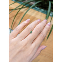 0.45 Ct. Bluish Green Sapphire from Madagascar Life Style