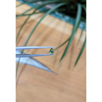 0.38 Ct. Bluish Green Sapphire from Madagascar Life Style