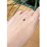 0.38 Ct. Bluish Green Sapphire from Madagascar Life Style