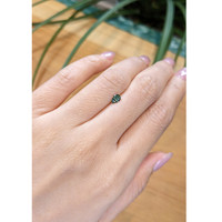 0.38 Ct. Bluish Green Sapphire from Madagascar Life Style