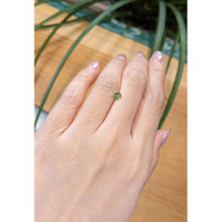 0.61 Ct. Yellowish Green Sapphire from Madagascar Life Style