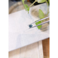 0.57 Ct. Bluish Green Sapphire from Madagascar Life Style