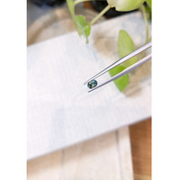 0.52 Ct. Greenish Blue Sapphire from Madagascar Life Style