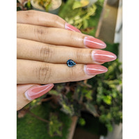1.21 Ct. Greenish Blue Sapphire from Madagascar Life Style