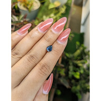 1.21 Ct. Greenish Blue Sapphire from Madagascar Life Style