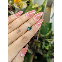 1.75 Ct. Greenish Blue Sapphire from Madagascar Life Style