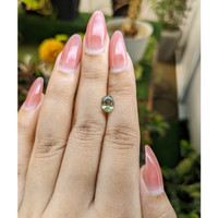 1.25 Ct. Yellowish Green Sapphire from Madagascar Life Style