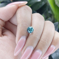 2.08 Ct. Bluish Green Sapphire from Madagascar Life Style