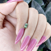 0.70 Ct. Green Sapphire from Madagascar Life Style