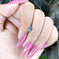 0.60 Ct. Green Sapphire from Madagascar Life Style