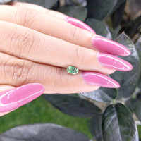 0.60 Ct. Green Sapphire from Madagascar Life Style