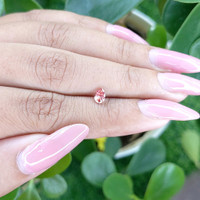 0.45 Ct. Pinkish Brown Sapphire from Madagascar Life Style