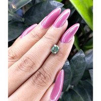 1.30 Ct. Bluish Green Sapphire from Madagascar Life Style