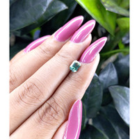 0.98 Ct. Bluish Green Sapphire from Madagascar Life Style