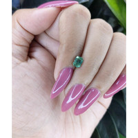 0.98 Ct. Bluish Green Sapphire from Madagascar Life Style