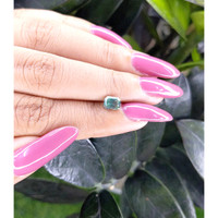 0.98 Ct. Bluish Green Sapphire from Madagascar Life Style
