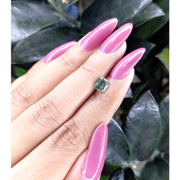 0.99 Ct. Bluish Green Sapphire from Madagascar Life Style