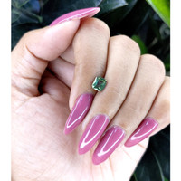 0.99 Ct. Bluish Green Sapphire from Madagascar Life Style