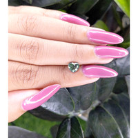 1.08 Ct. Green Sapphire from Madagascar Life Style